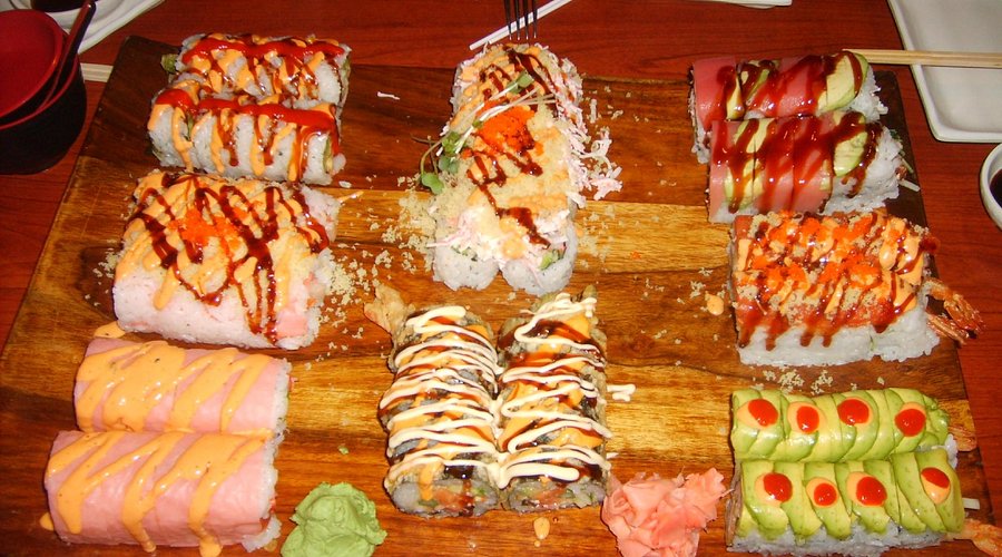 AI Fusion Sushi & Grill signature dishes BibimbapSpecialty Sushi Rolls (e.g., AI Fusion Roll)BulgogiBento Boxes